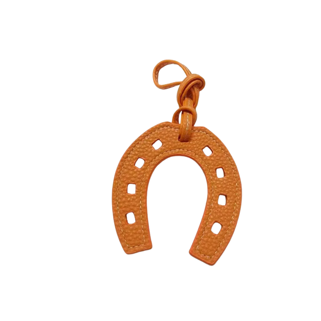 HORSESHOE ORANGE CHARM